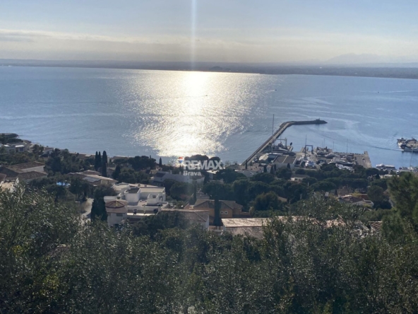 Roses, Puig Rom | Exclusiva parcela con vistas panorámicas a la Bahía de Roses y proyecto llave en mano